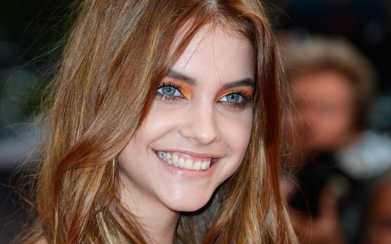 woman with blue eyes smiling