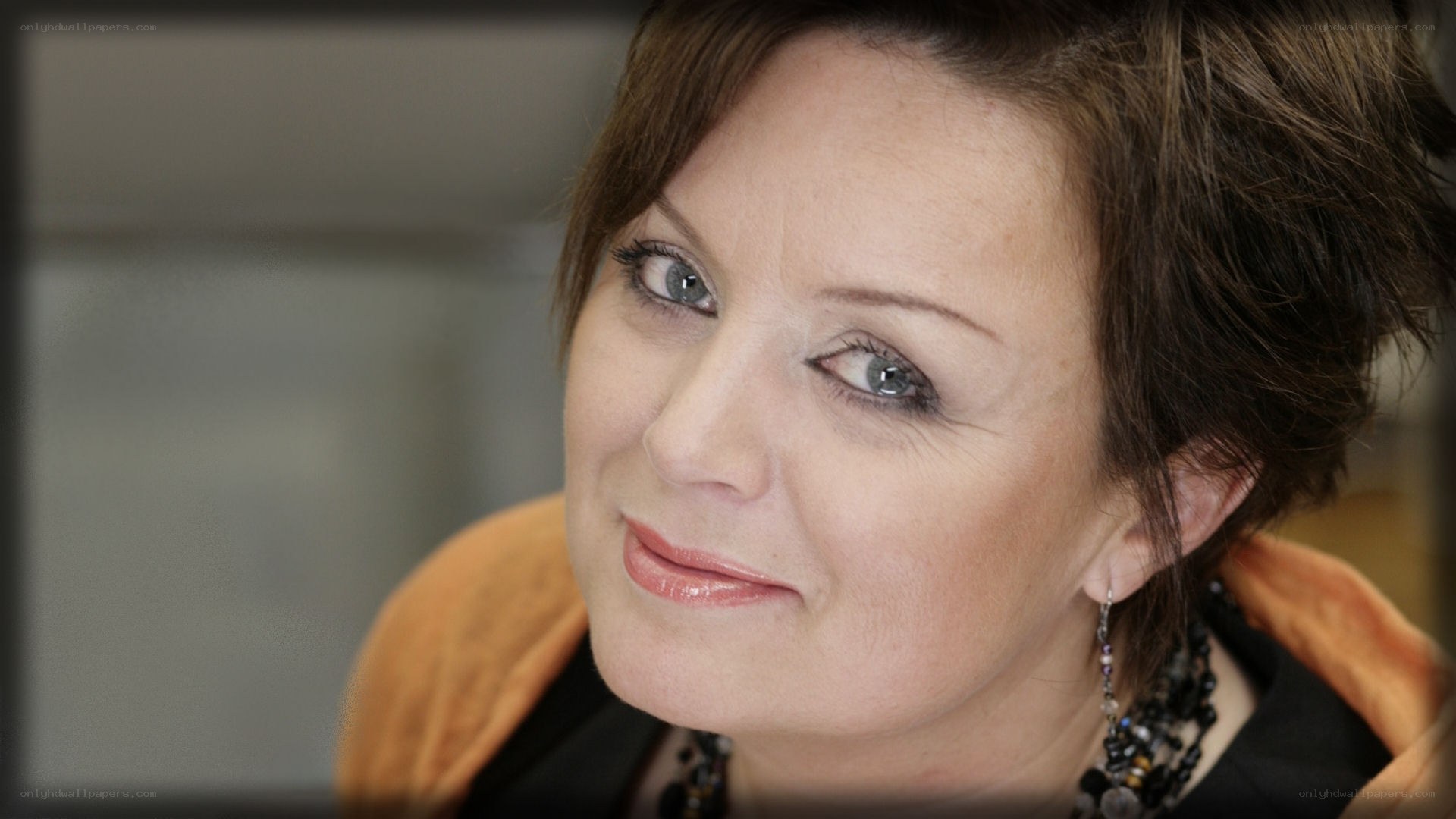 woman with blue eyes smiling
