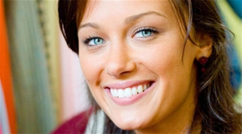 woman with blue eyes smiling