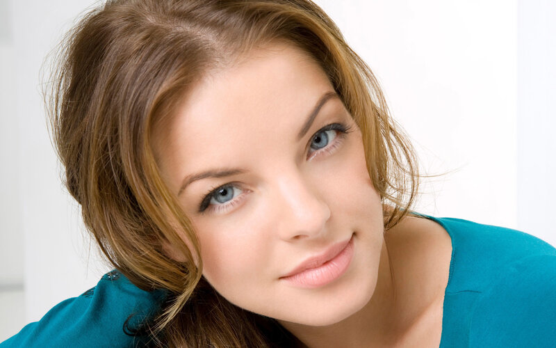woman with blue eyes smiling