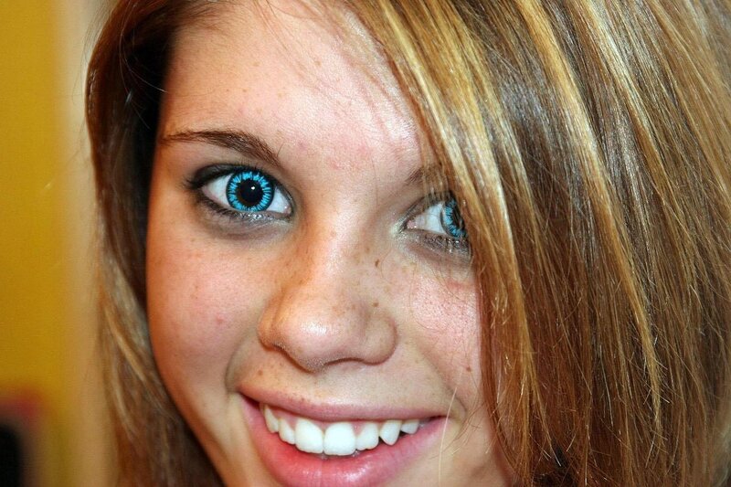 woman with blue eyes smiling