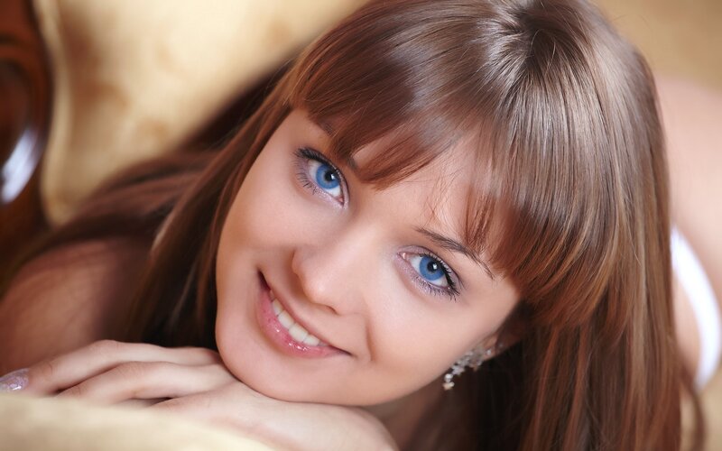 woman with blue eyes smiling