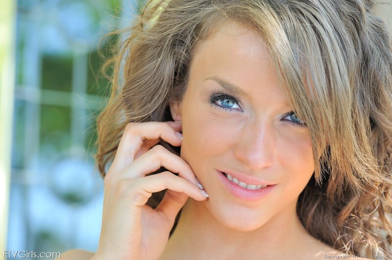 woman with blue eyes smiling