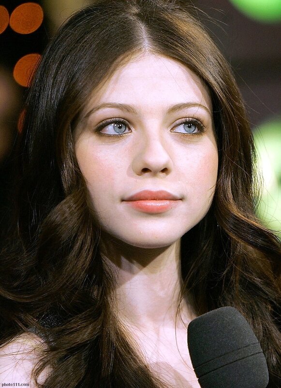 woman with blue eyes speaking
