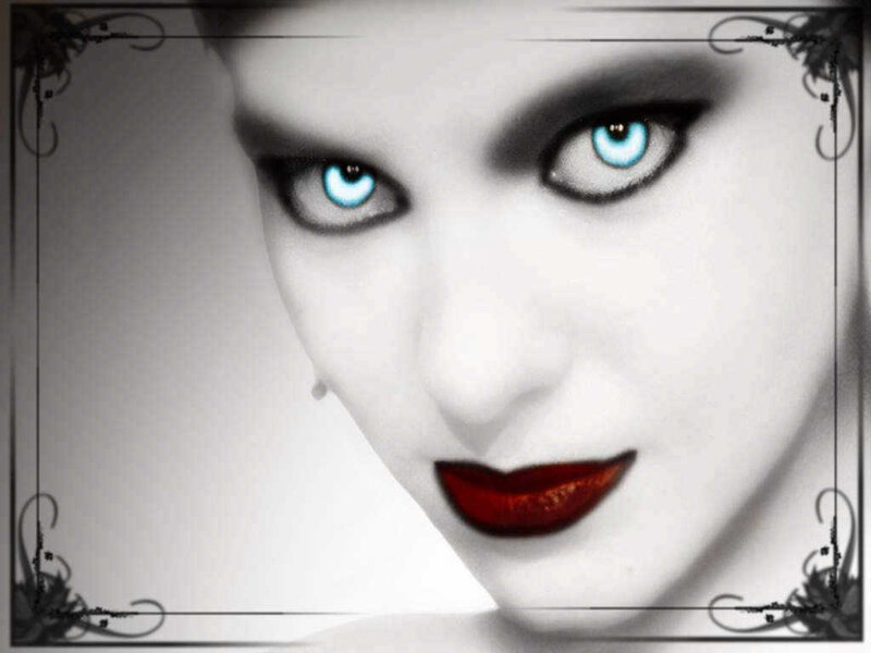 Woman with Blue Eyes — White, Dramatic, Photograph, Red Lips, Dark Makeup