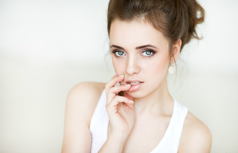 Woman with Blue Eyes — White, Neutral, Photograph, White Top, Earring