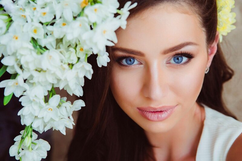 Woman with Blue Eyes — White, Serene, Photograph, White Flowers