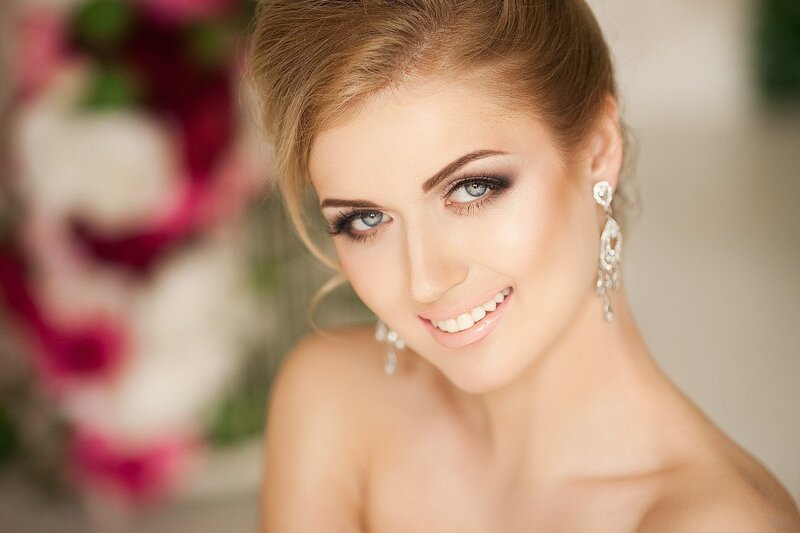 Woman with Blue Eyes — White, Smiling