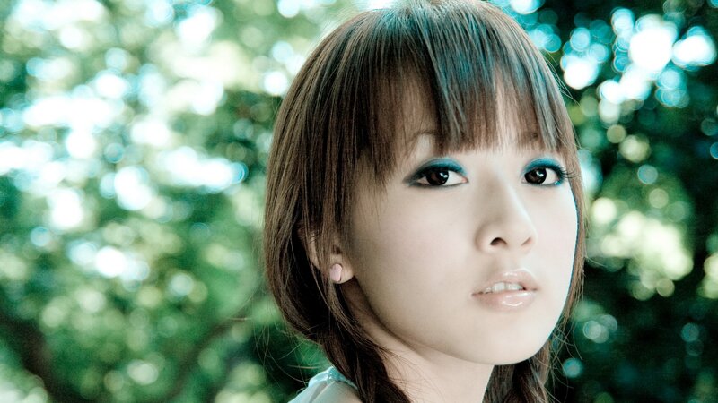 woman with blue eyeshadow outdoors