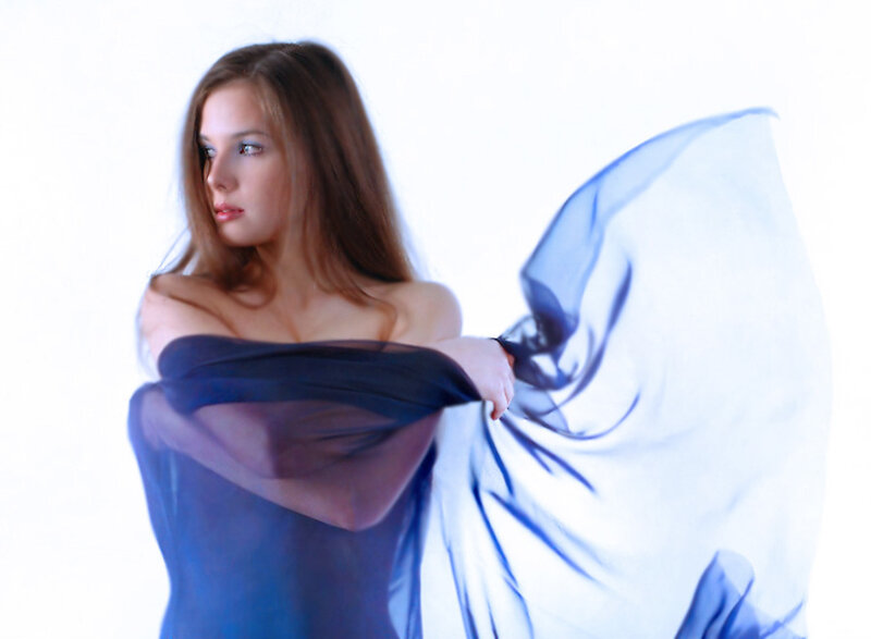 Woman with Blue Fabric — Serene