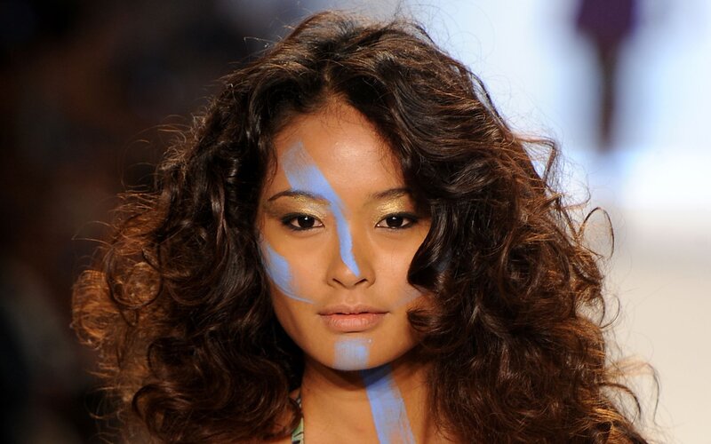 Woman with Blue Face Paint — Brown, Dramatic