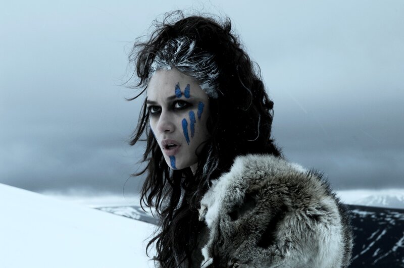 woman with blue face paint in snow