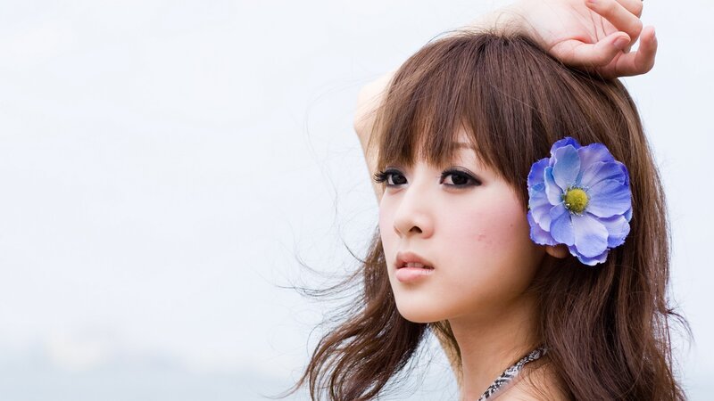 Woman with Blue Flower — Calm, Photograph, Hair