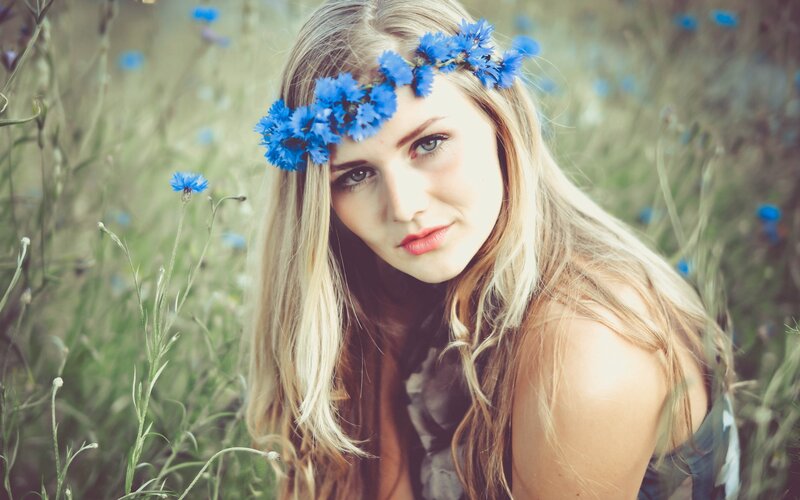woman with blue flower crown