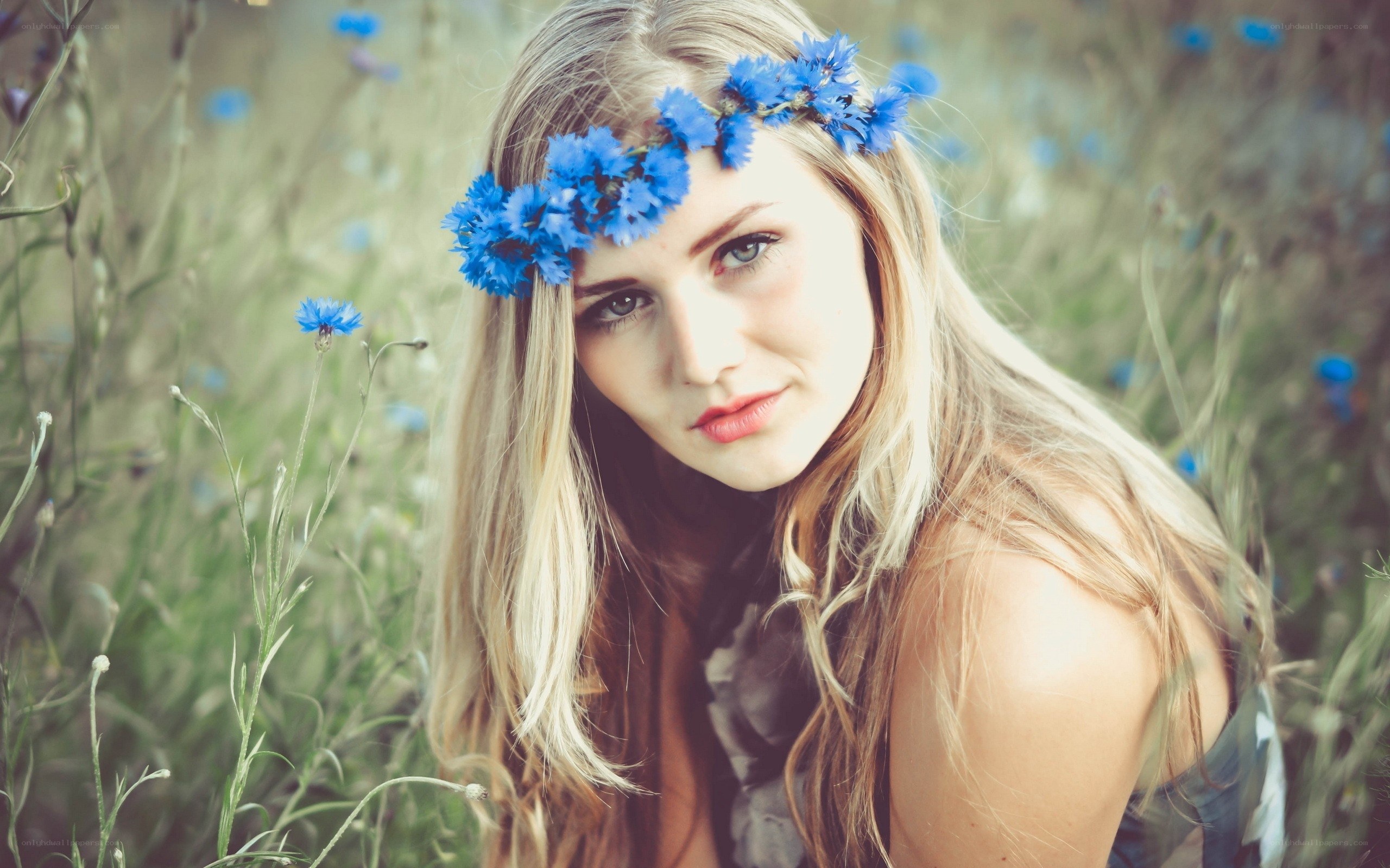 woman with blue flower crown