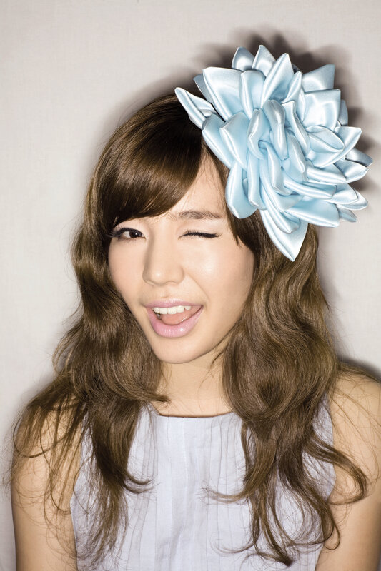 woman with blue flower headpiece