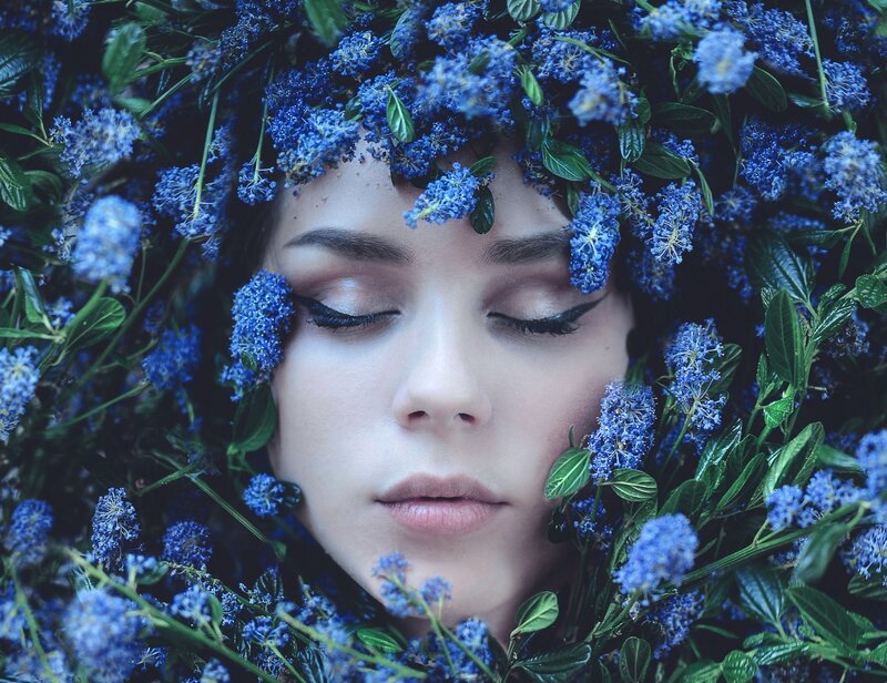 woman with blue flowers