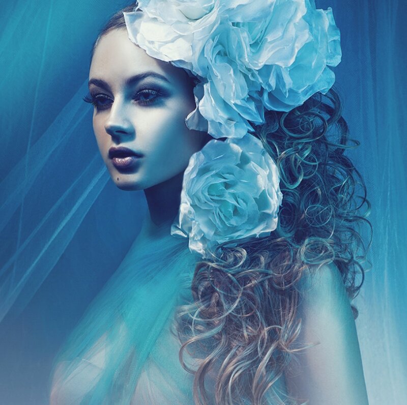 Woman with Blue Flowers — Dramatic, Photograph, Curly Hair