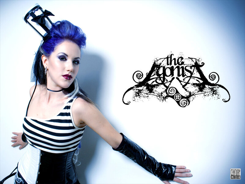 woman with blue hair and striped top