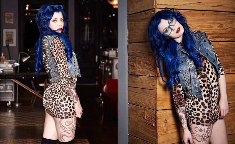 woman with blue hair and tattoos