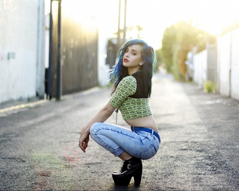 woman with blue hair in alley