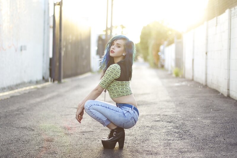 woman with blue hair in alley