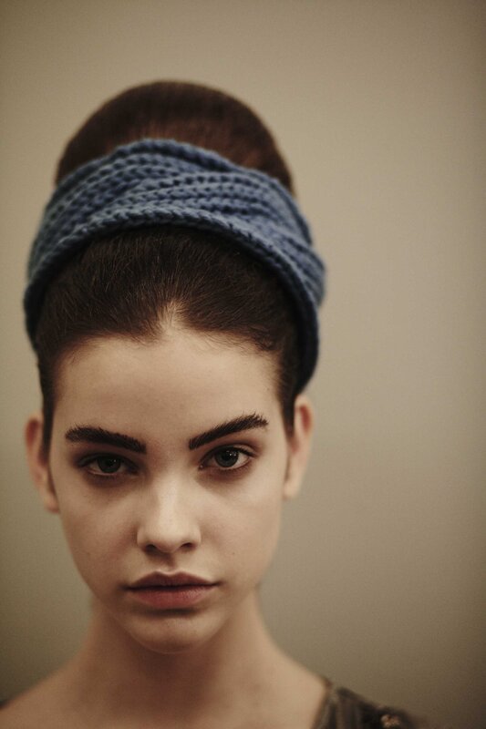 woman with blue headband