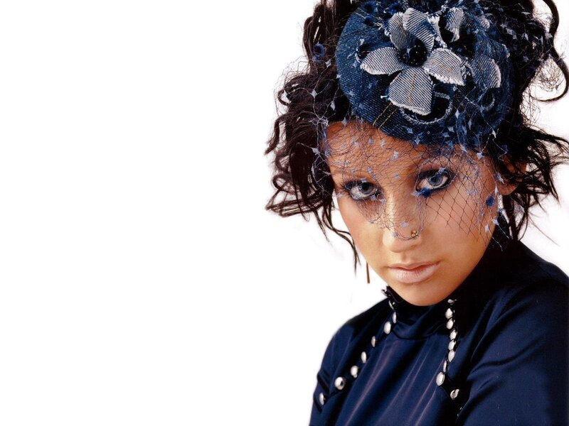woman with blue headpiece