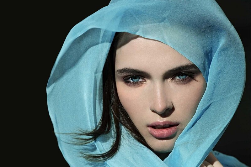 woman with blue headscarf
