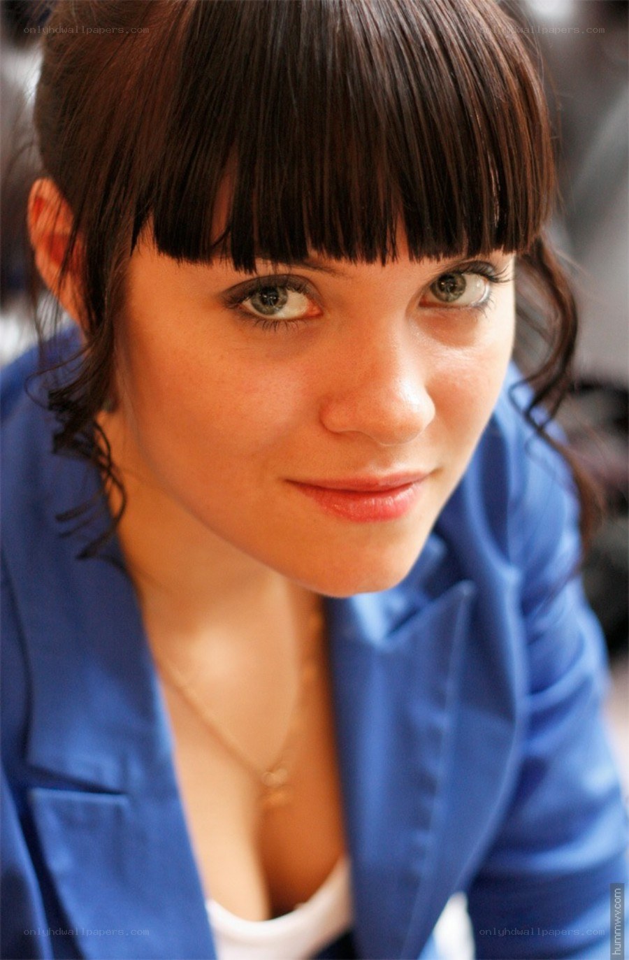 woman with blue jacket