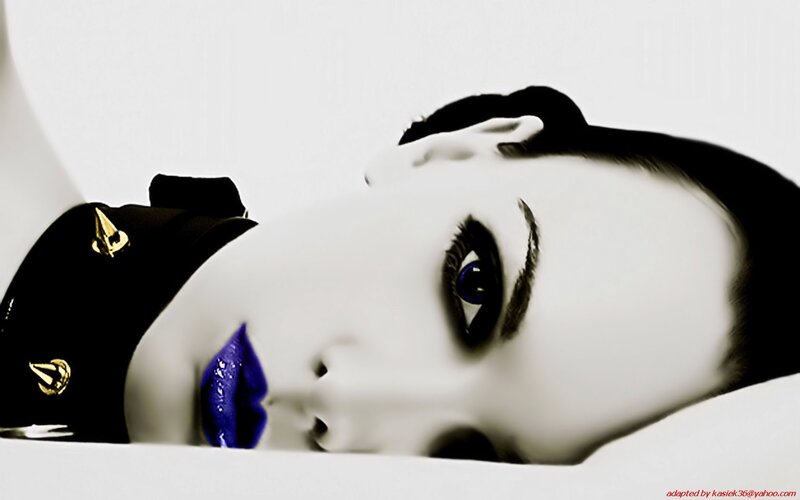 woman with blue lips and eyes