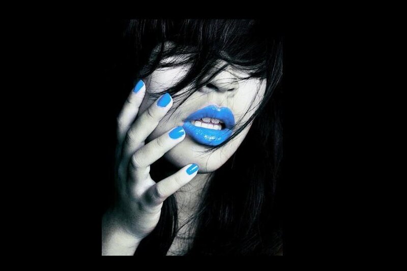 woman with blue lips and nails
