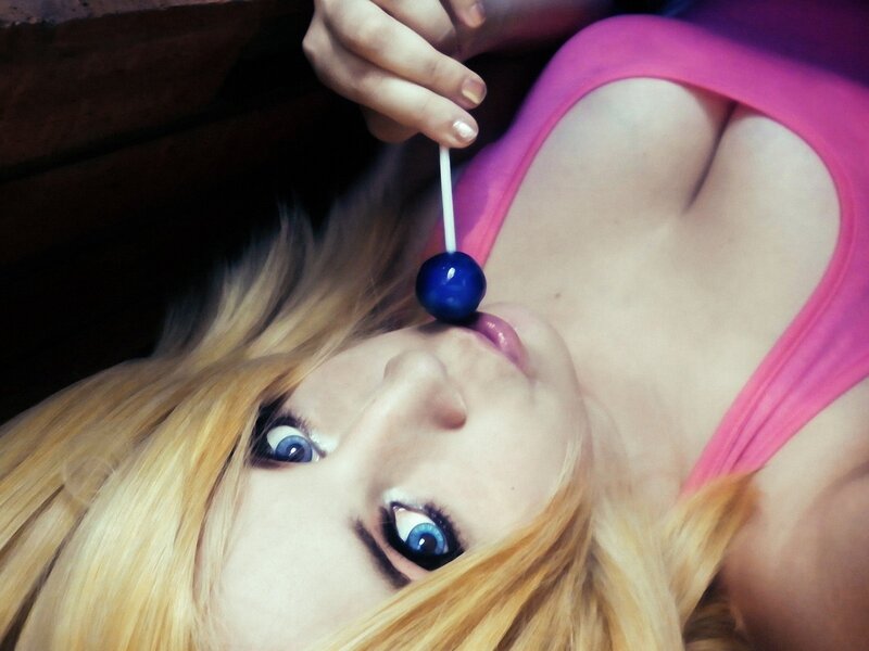 woman with blue lollipop