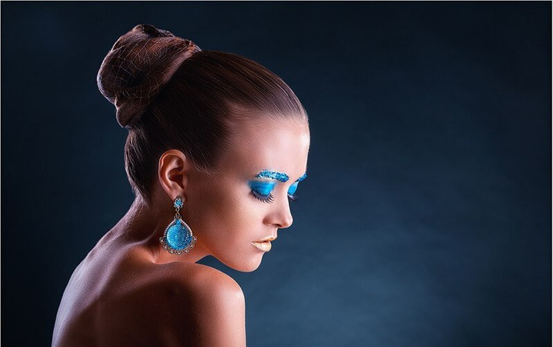 Woman with Blue Makeup — Dramatic, Photograph, Earrings, Hair Bun
