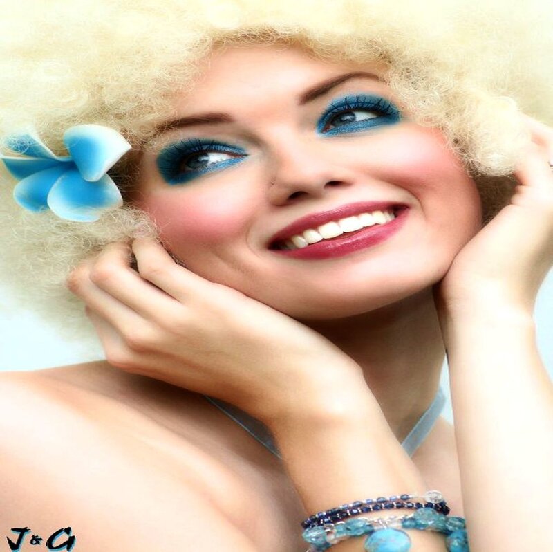 Woman with Blue Makeup — Happy
