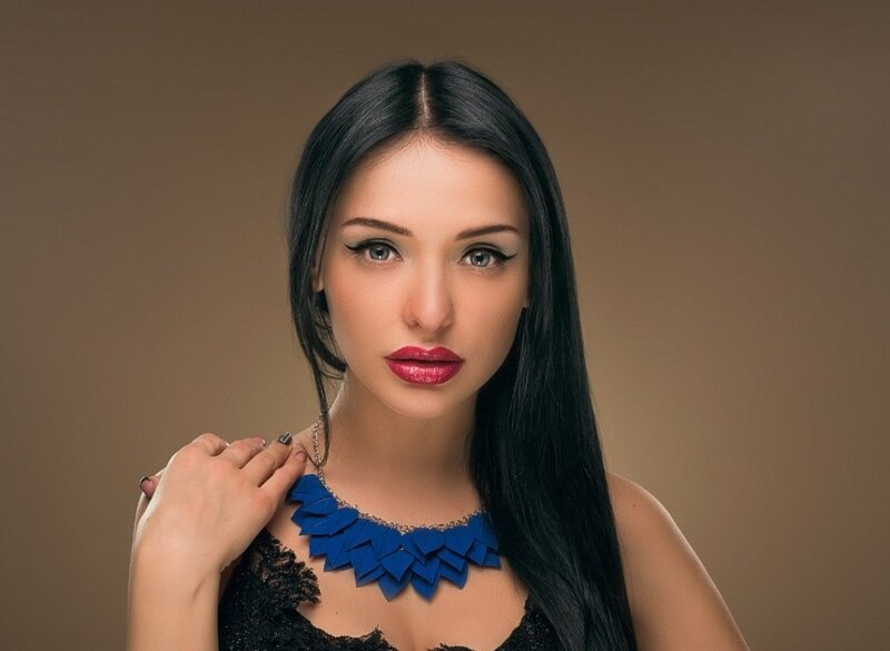 Woman with Blue Necklace — Neutral