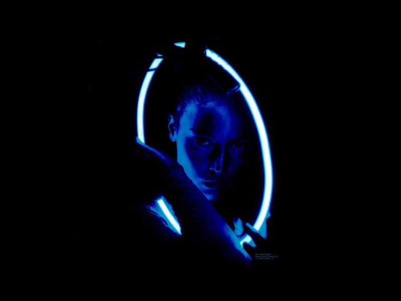 woman with blue neon ring