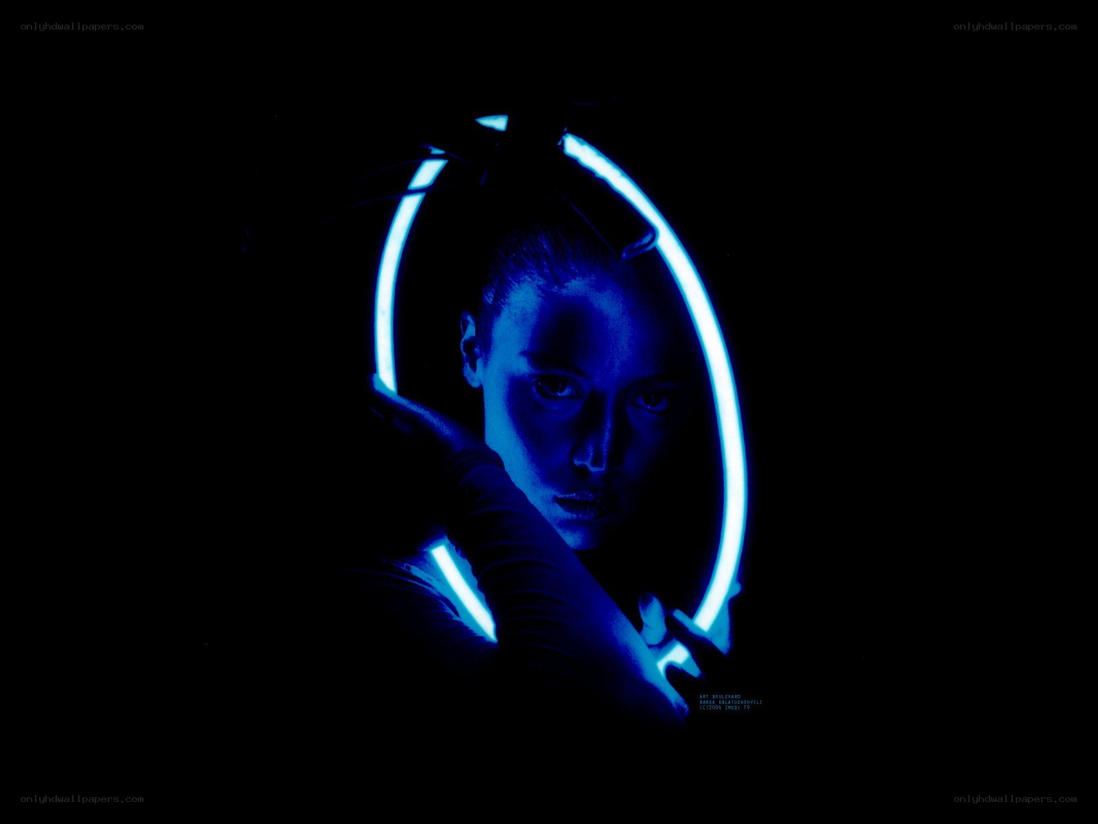 woman with blue neon ring