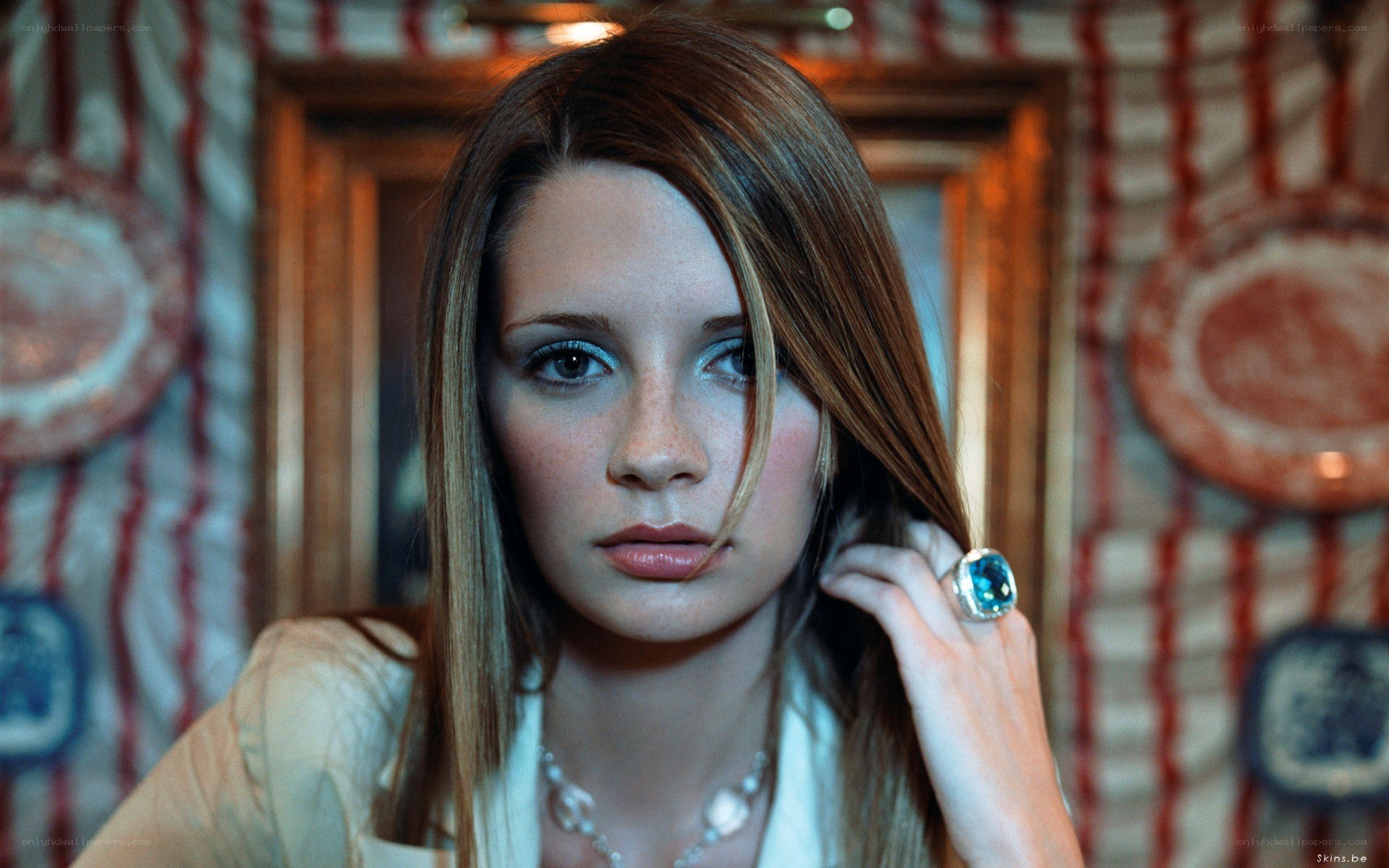 woman with blue ring
