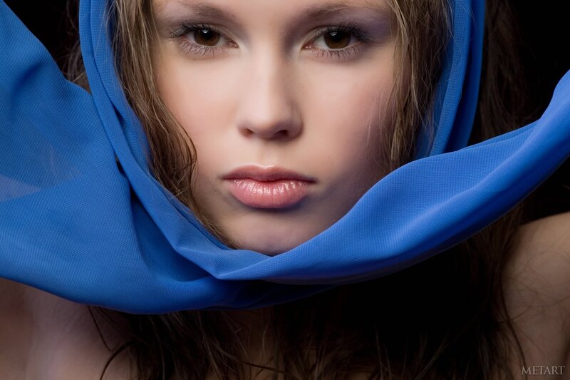 woman with blue scarf