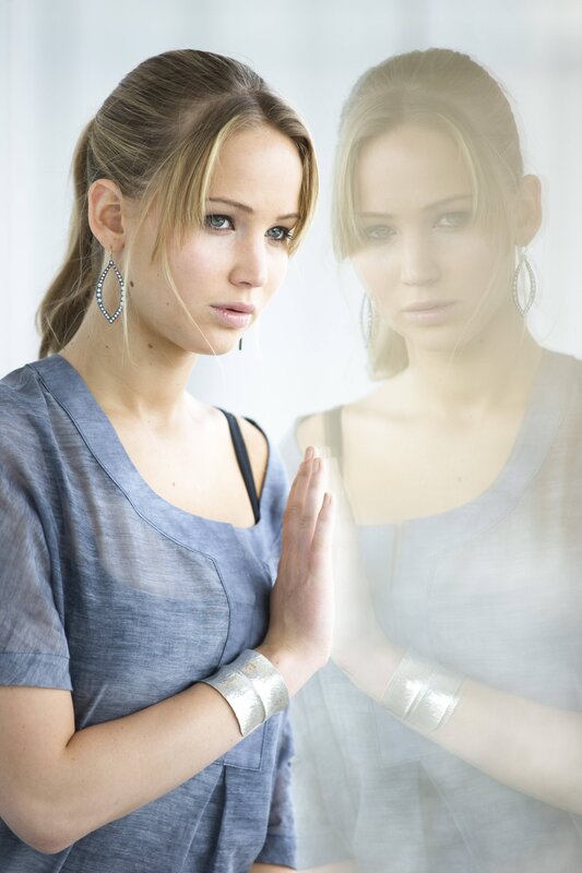 Woman with Blue Shirt — Contemplative