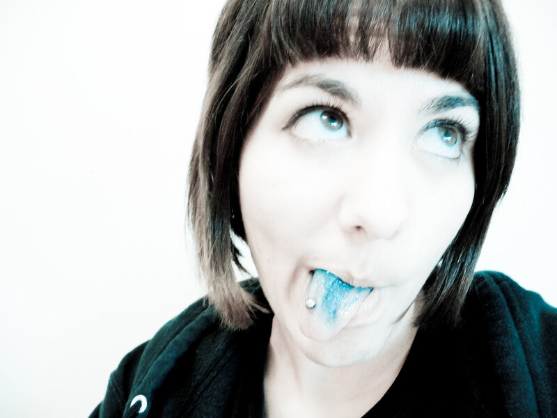 woman with blue tongue piercing