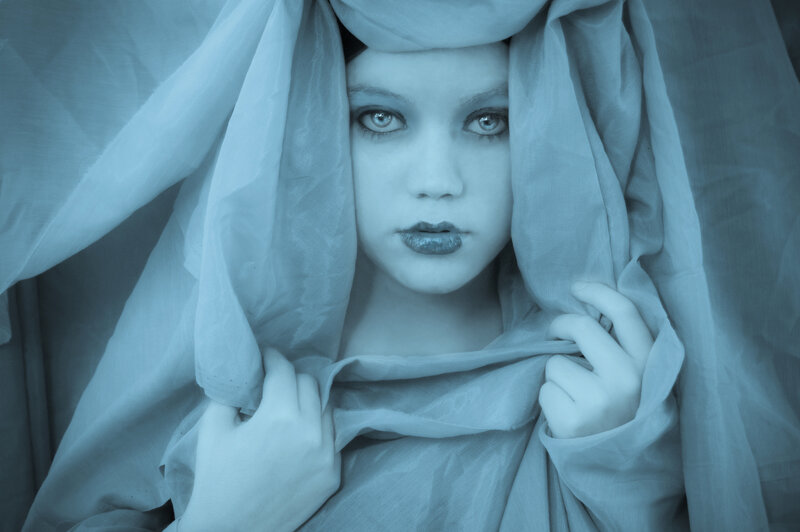 woman with blue veil