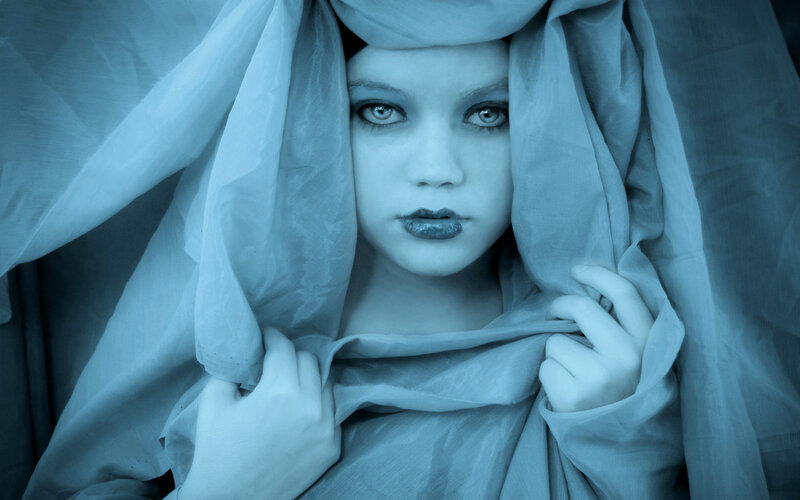 woman with blue veil