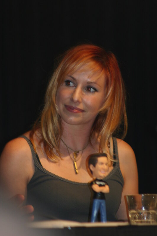 woman with bobblehead figurine