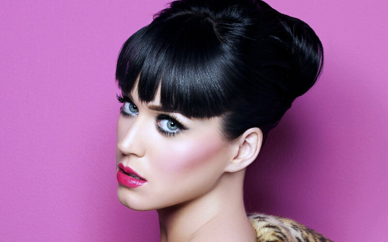 woman with bold makeup and hairstyle