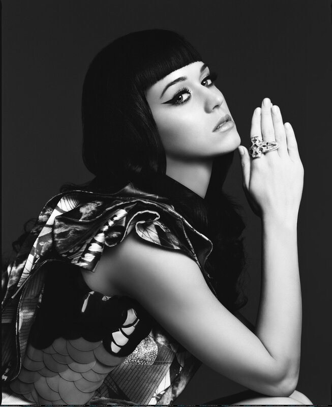 woman with bold makeup and ring