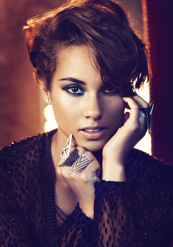 woman with bold makeup and rings