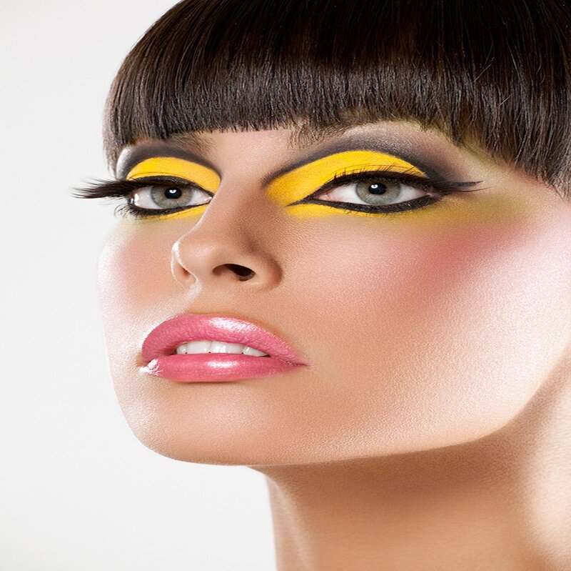 Woman with Bold Makeup — Yellow