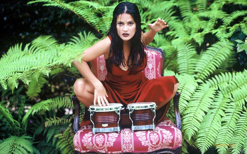 Woman with bongos in garden